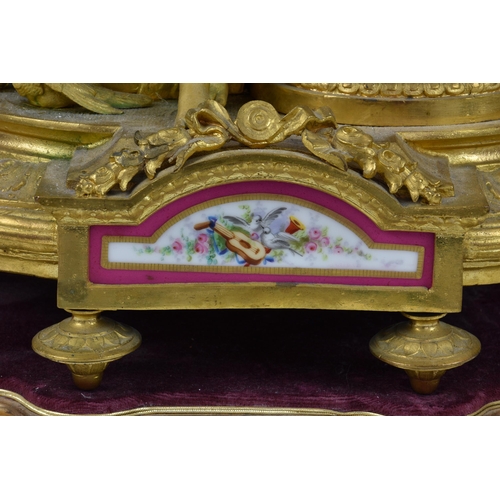 208 - A French gilt metal and porcelain mantel clock, emblematic of Innocence, late 19th / early 20th cent... 