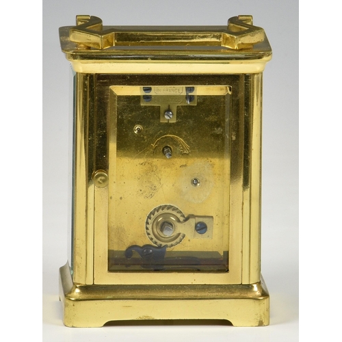 241 - A late 19th century French brass carriage clock with leather travel case, the white enamel dial with... 