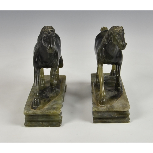 2865 - A near pair of carved green soapstone horses, 20th century, raised on rectangular plinths, 6 ½in. (1... 