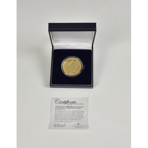 421 - Numismatics interest - The London Mint Gold-plated silver Tristan Da Cunha 'Queens Titles' Five Poun... 