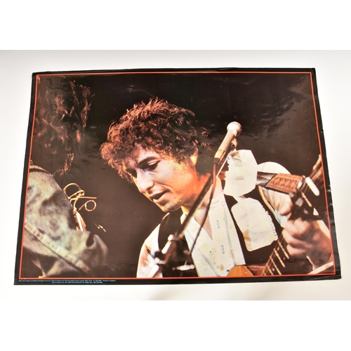 536 - Bob Dylan in Concert colour poster, 1978 European Tour, 33 x 23 5/8in. (84 x 60cm.); together with a... 