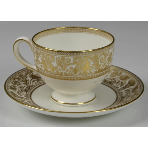 61 - A Wedgwood China 'Gold Florentine' pattern tea service, comprising of teapot, six cups & saucers, ca... 