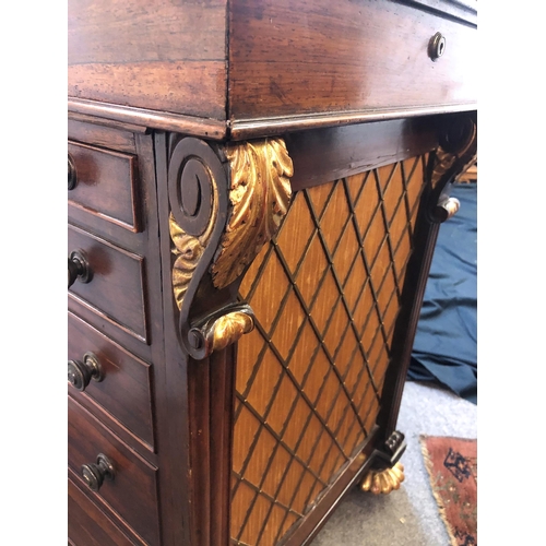 830 - A William IV rosewood and parcel gilt Davenport desk in the manner of Gillows of Lancaster, the slid... 