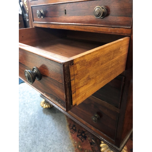 830 - A William IV rosewood and parcel gilt Davenport desk in the manner of Gillows of Lancaster, the slid... 