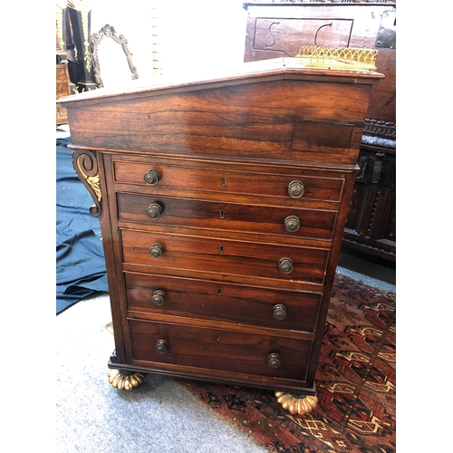 830 - A William IV rosewood and parcel gilt Davenport desk in the manner of Gillows of Lancaster, the slid... 