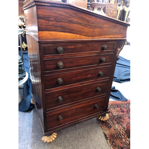 830 - A William IV rosewood and parcel gilt Davenport desk in the manner of Gillows of Lancaster, the slid... 