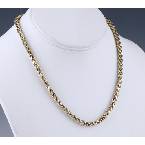 1076 - An 18ct two colour gold and diamond palma chain necklace, the clasp terminals set with rings of bril... 