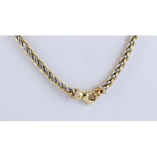 1076 - An 18ct two colour gold and diamond palma chain necklace, the clasp terminals set with rings of bril... 