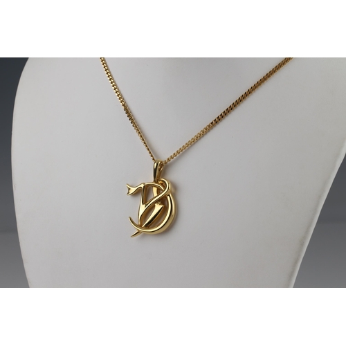 1077 - A Catherine Best 18ct gold pendant necklace, in the form of intertwined initials, on an 18ct gold cu... 