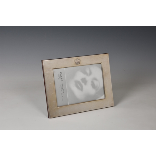 112 - A modern silver photo frame with Royal crown, Carrs of Sheffield, 2005, rectangular with applied Roy... 