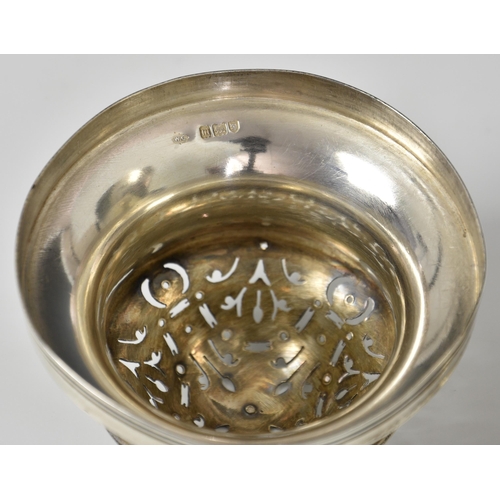 129 - An Edwardian silver sugar caster, William Comyns & Sons, London, 1907, urn form, circular steppe... 