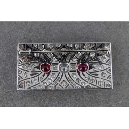 1333 - A fine Art Deco platinum, diamond and synthetic ruby plaque brooch, 1930s, the rectangular panel wit... 