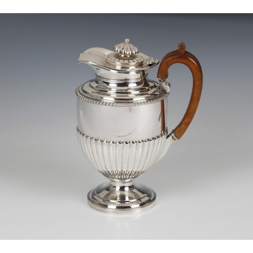 141 - A George III hallmarked silver pedestal coffee pot and cover, William Burwash, London, 1815, of circ... 