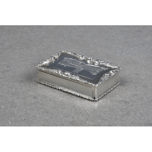 142 - A George IV silver castle-top snuff box, Nathaniel Mills, Birmingham, 1829, of large proportions, re... 