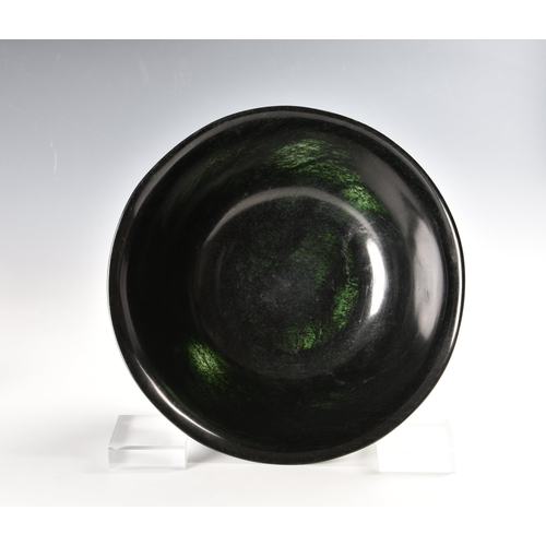 1476 - A graduated pair of Chinese deep spinach green jade bowls, probably 20th century, of deep, rounded f... 