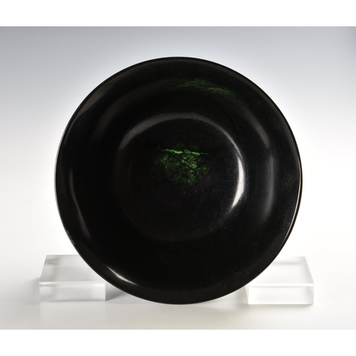 1476 - A graduated pair of Chinese deep spinach green jade bowls, probably 20th century, of deep, rounded f... 