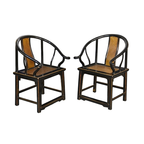 1480 - A pair of Chinese black lacquered elm wood horseshoe back armchairs, probably Qing Dynasty, 19th cen... 