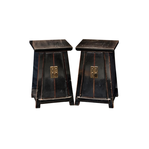 1482 - A pair of Chinese black lacquered elmwood two door tapered small cabinets, probably Qing Dynasty, 19... 