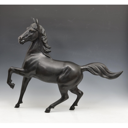 1489 - A large Chinese patinated bronze sculpture of a horse / stallion, first half twentieth century, mode... 