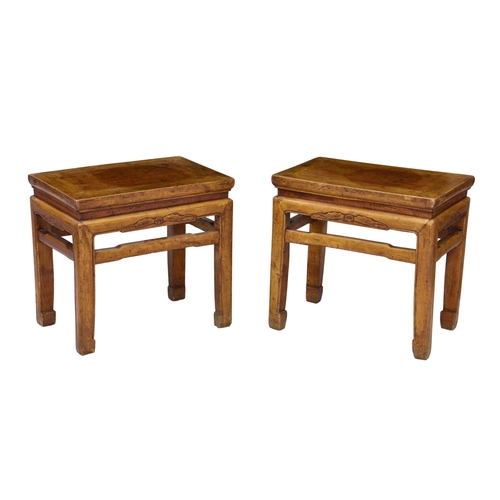 1502 - A pair of Chinese yellow hardwood rectangular stands or tables, probably late 19th century, the clea... 