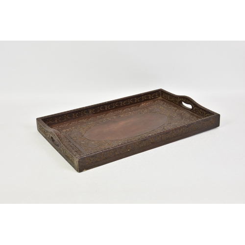 1508 - An Anglo-Indian carved hardwood tray, early 20th century, carved with foliage and flowers, with pier... 