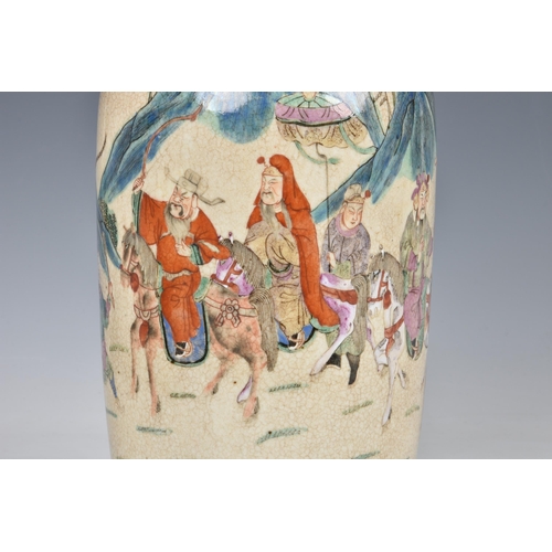 1525 - A Chinese famille rose crackle glaze rouleau vase, probably early 20th century, painted with a proce... 