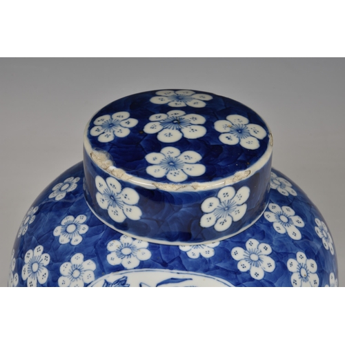 1526 - A Chinese blue and white ginger jar, probably early 20th century, with two shaped reserves of room i... 