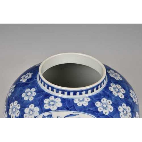 1526 - A Chinese blue and white ginger jar, probably early 20th century, with two shaped reserves of room i... 