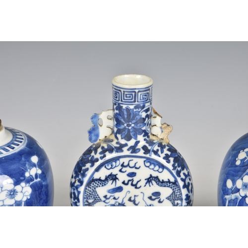 1528 - Four Chinese blue and white prunus blossom ginger jars, 20th century, three with dentil band to the ... 