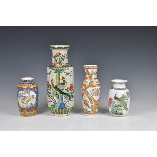 1530 - A Chinese Canton famille rose vase, late 19th / early 20th century, slightly lobed baluster form wit... 