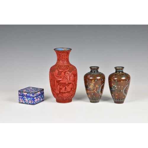 1533 - A Chinese cinnabar lacquer vase, early 20th century, baluster form, carved with figures and building... 