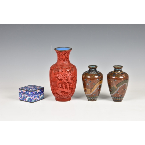 1533 - A Chinese cinnabar lacquer vase, early 20th century, baluster form, carved with figures and building... 