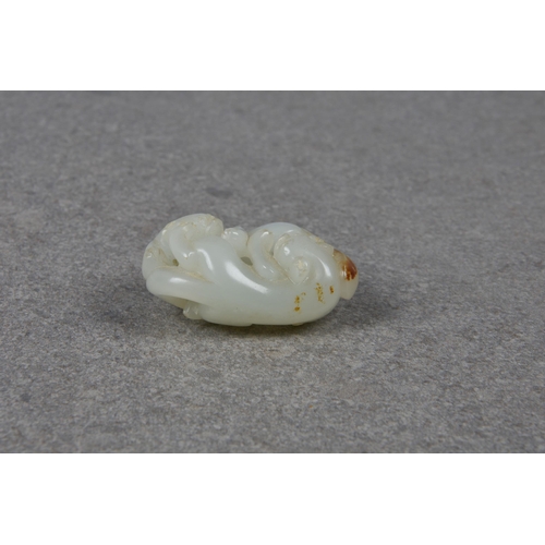 1554 - A Chinese pale celadon and russet mottled jade carving of two chilong, probably Qing dynasty, locked... 