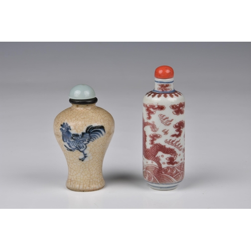 1561 - Two Chinese porcelain snuff bottles, one of cylindrical form with short, straight neck, painted in r... 