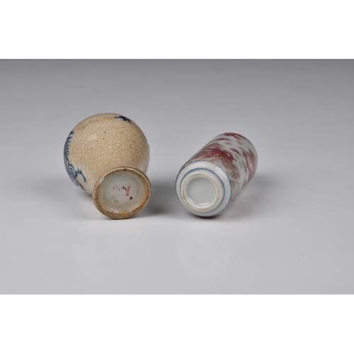 1561 - Two Chinese porcelain snuff bottles, one of cylindrical form with short, straight neck, painted in r... 