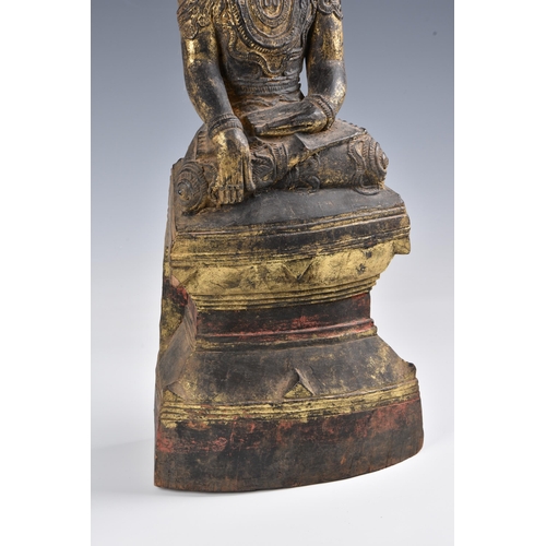 1587 - A Burmese, Shan States style carved gilt decorated Buddha, probably 19th century, the carved wooden ... 