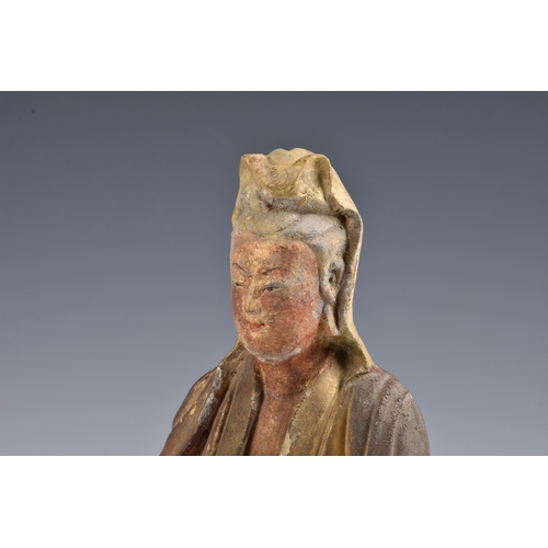 1588 - A Chinese stucco figure of Guanyin, believed to be Yuan Dynasty (AD1280-1368), polychrome painted an... 