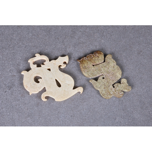 1604 - A Chinese Warring States style opaque jade dragon pendant and a Han style jade dragon pendant (2), t... 