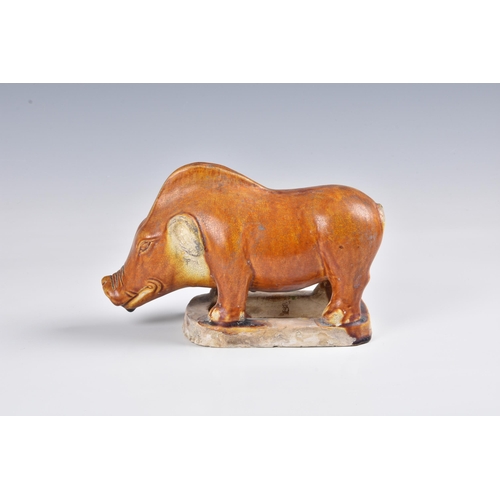 1629 - A Chinese chestnut glazed model of a boar, probably Tang Dynasty (618-907), the glaze with a file cr... 