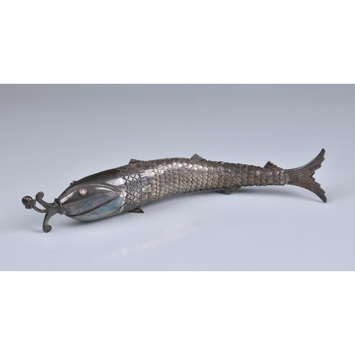 163 - A large articulated white metal fish scent bottle, apparently unmarked, probably Mexican or Spanish,... 