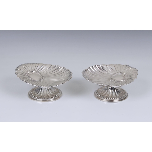 164 - A pair of Victorian silver pedestal scallop shell dishes, L Spiers, Birmingham, 1892, of shaped scal... 