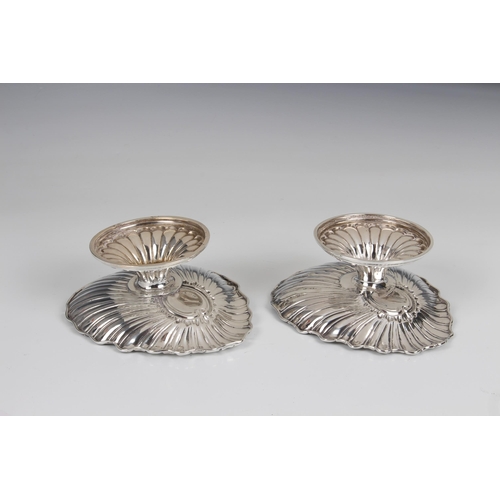 164 - A pair of Victorian silver pedestal scallop shell dishes, L Spiers, Birmingham, 1892, of shaped scal... 