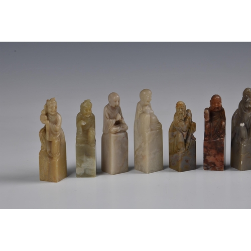 1640 - A group of fifteen Chinese carved soapstone seals, each depicting a Daoist immortal, second half 20t... 