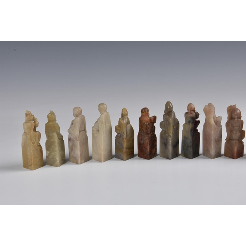 1640 - A group of fifteen Chinese carved soapstone seals, each depicting a Daoist immortal, second half 20t... 