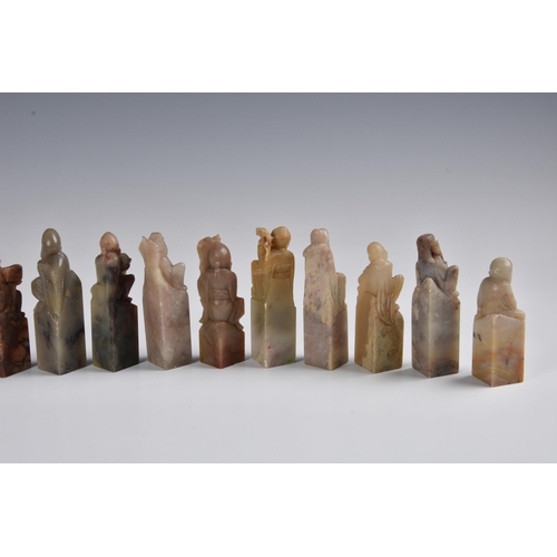 1640 - A group of fifteen Chinese carved soapstone seals, each depicting a Daoist immortal, second half 20t... 