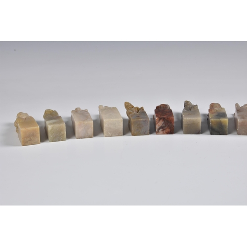 1640 - A group of fifteen Chinese carved soapstone seals, each depicting a Daoist immortal, second half 20t... 