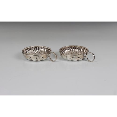 165 - A pair of George V English silver tastevin, Levesley Brothers (Thomas Levesley), Sheffield, 1912, ea... 