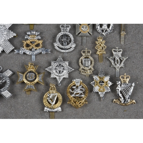 1787 - A collection of various Military anodised aluminium cap badges etc, to include Queens Own Yeomanry; ... 