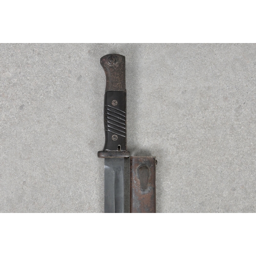 1816 - A Second War German Mauser K98 bayonet with blackened blade, with metal scabbard, numbers not matchi... 