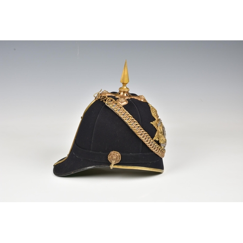 1834 - A 1st Royal Guernsey Militia Victorian Officer's black cloth Helmet, the black cloth covered skull w... 